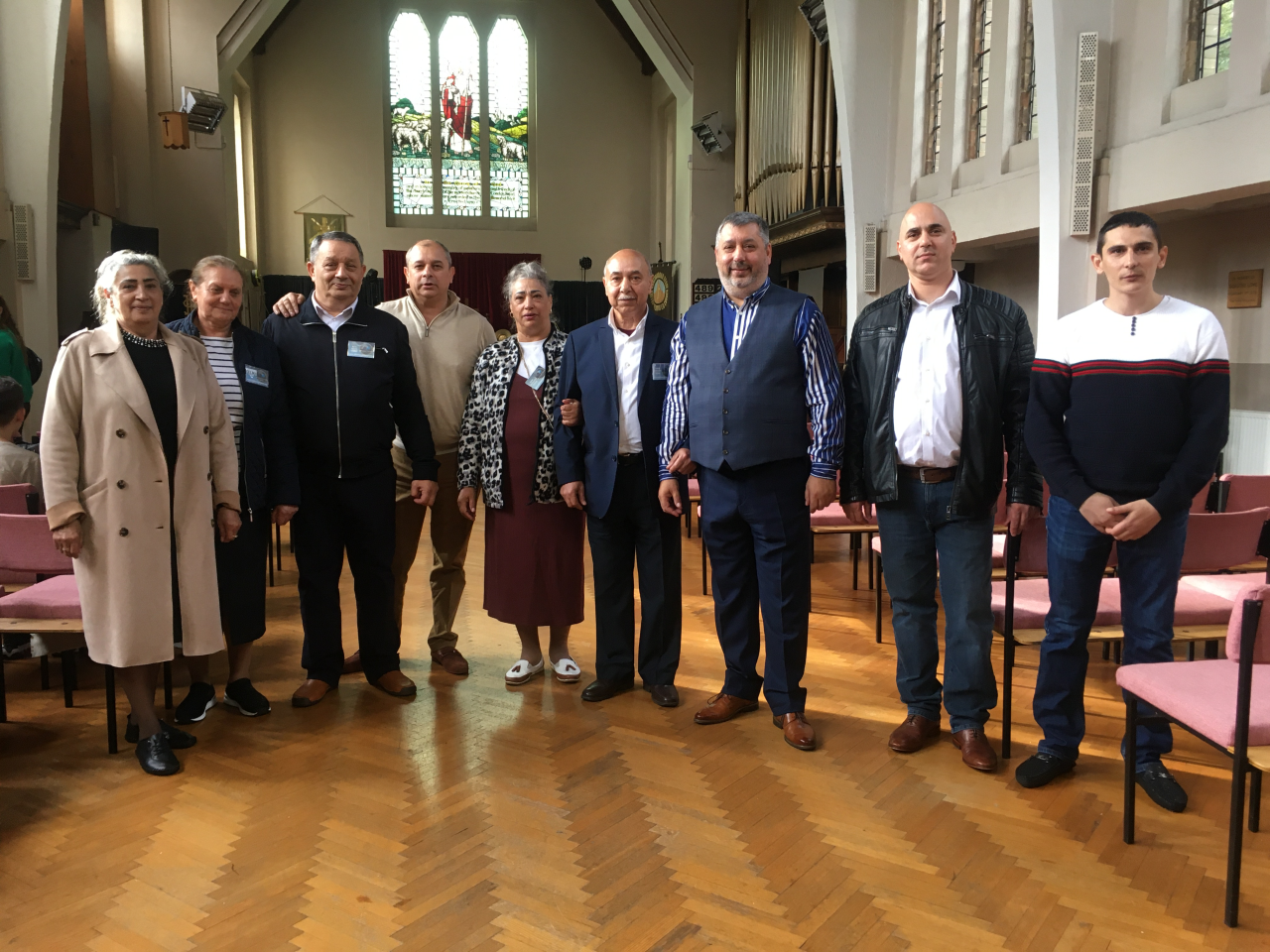 Figure 3. Members of the Dēleski ģimena congregation after the service. From the left, fifth to seventh – ushers Zara Burkeviča, Pēteris Leimanis, and pastor Argo Dagmars Gindra, August 27, 2023 (photograph by Ieva Weaver; the photo is used with the permission of the church members).